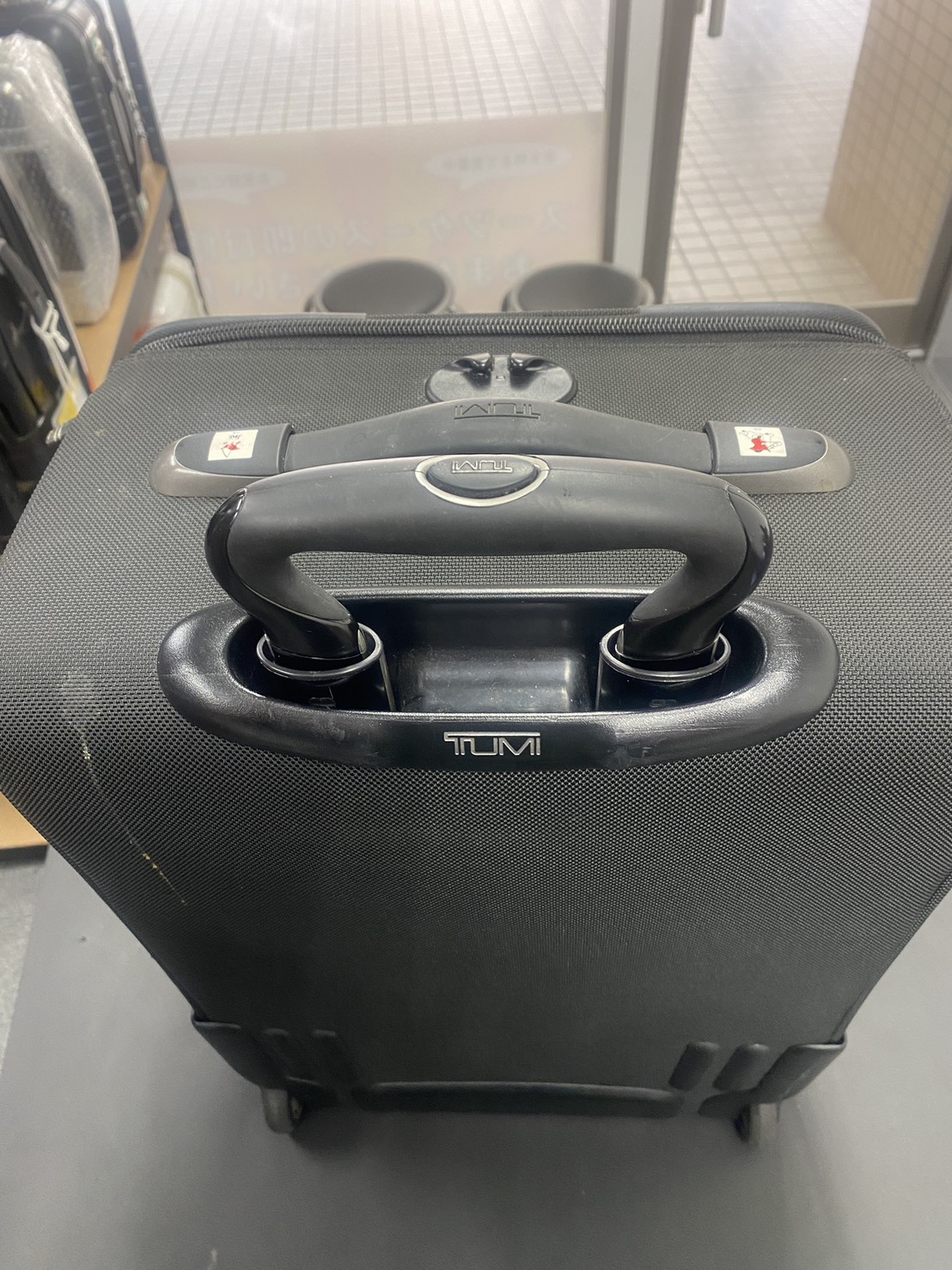 TUMI　伸縮ハンドル　代用品交換　修理前