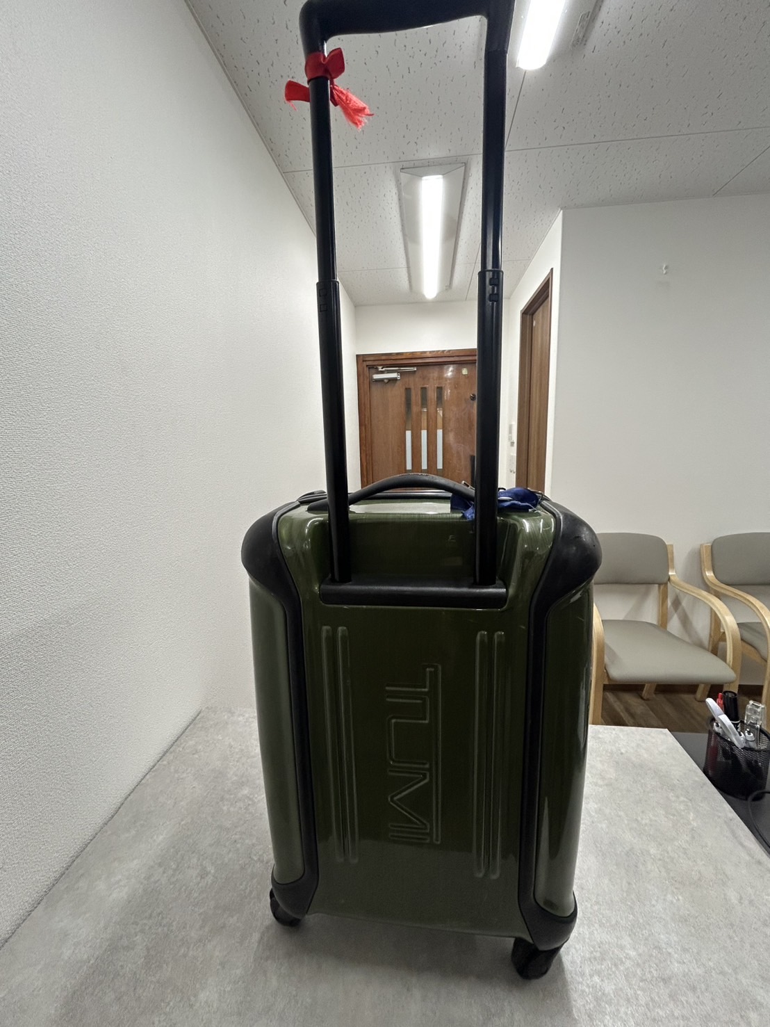 TUMI　伸縮ハンドル純正品　修理前